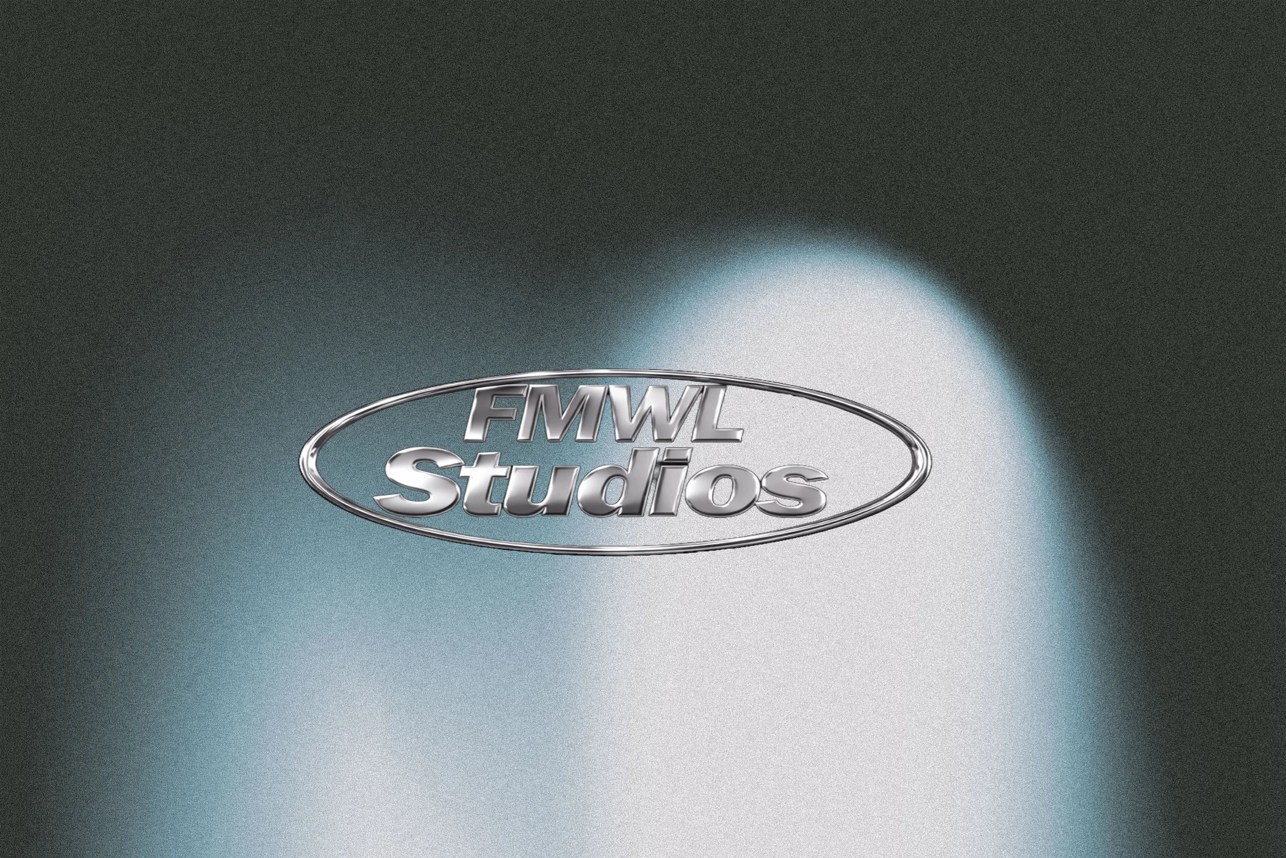 Silver metallic logo with the text 'FMWL Studios' on a dark background with a light spot.