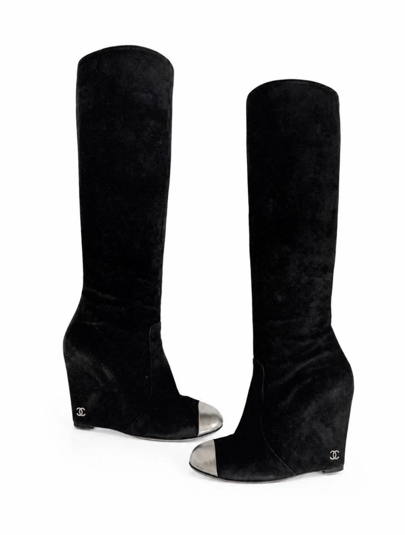 Close up full view of black Chanel wedge boots