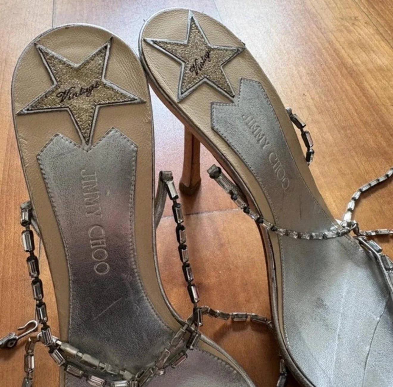 up close view of vintage jimmy choo heels, star detail