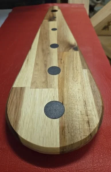 Equinox charcuterie board accented with silver fleck epoxy inlay