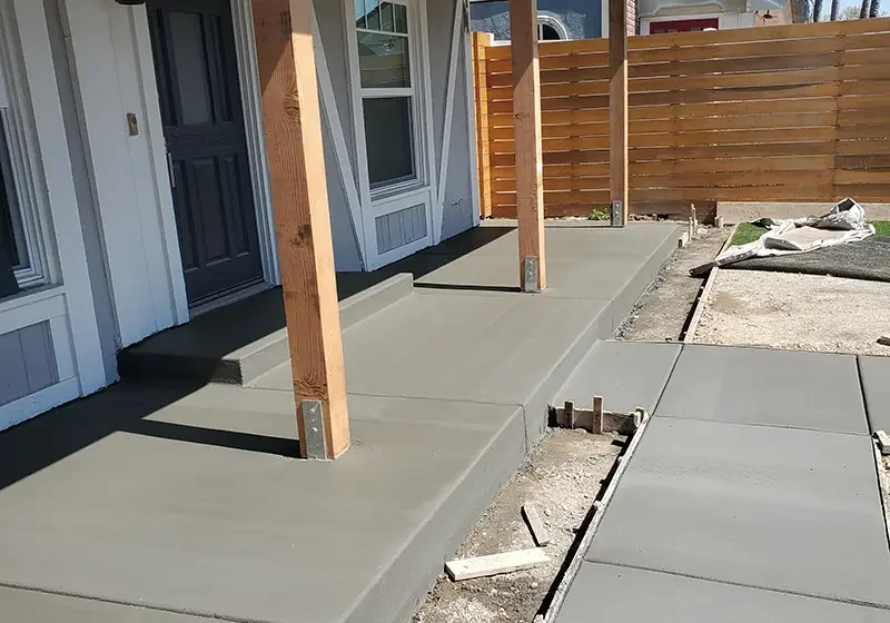 concrete entryway with steps.
