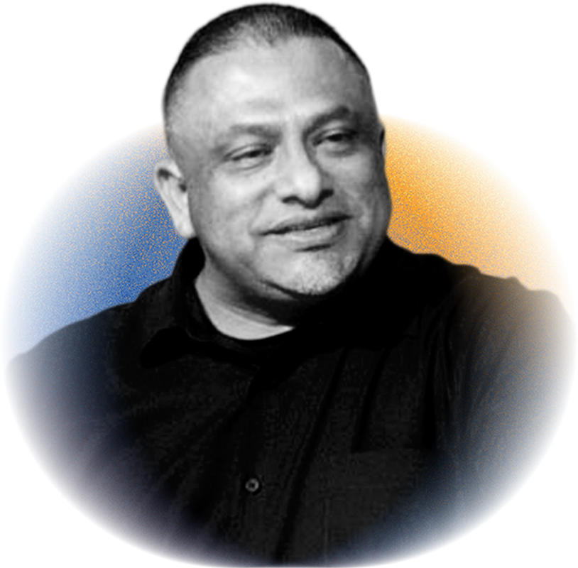 A black and white portrait of a smiling man with short hair, wearing a black shirt, with a background of blue and orange colors.