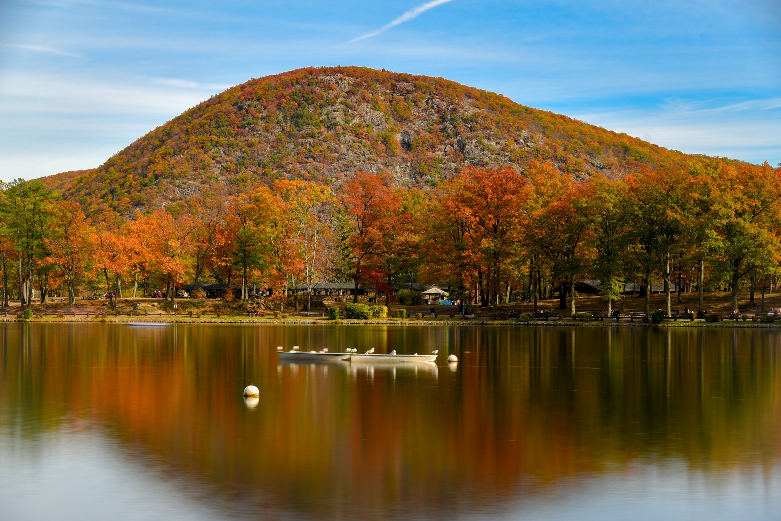 Autumn at Bear Mountain
The fiery oranges of the Hudson Highlands reflecting perfectly in the still waters of Hessian Lake.