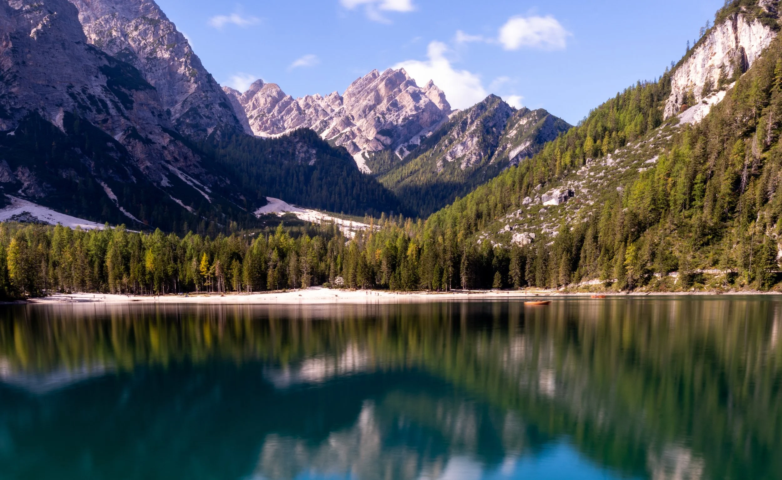 Alpine Tarn
A secluded, crystal-clear pool of glacial water hidden among the jagged folds of the Italian Alps.
