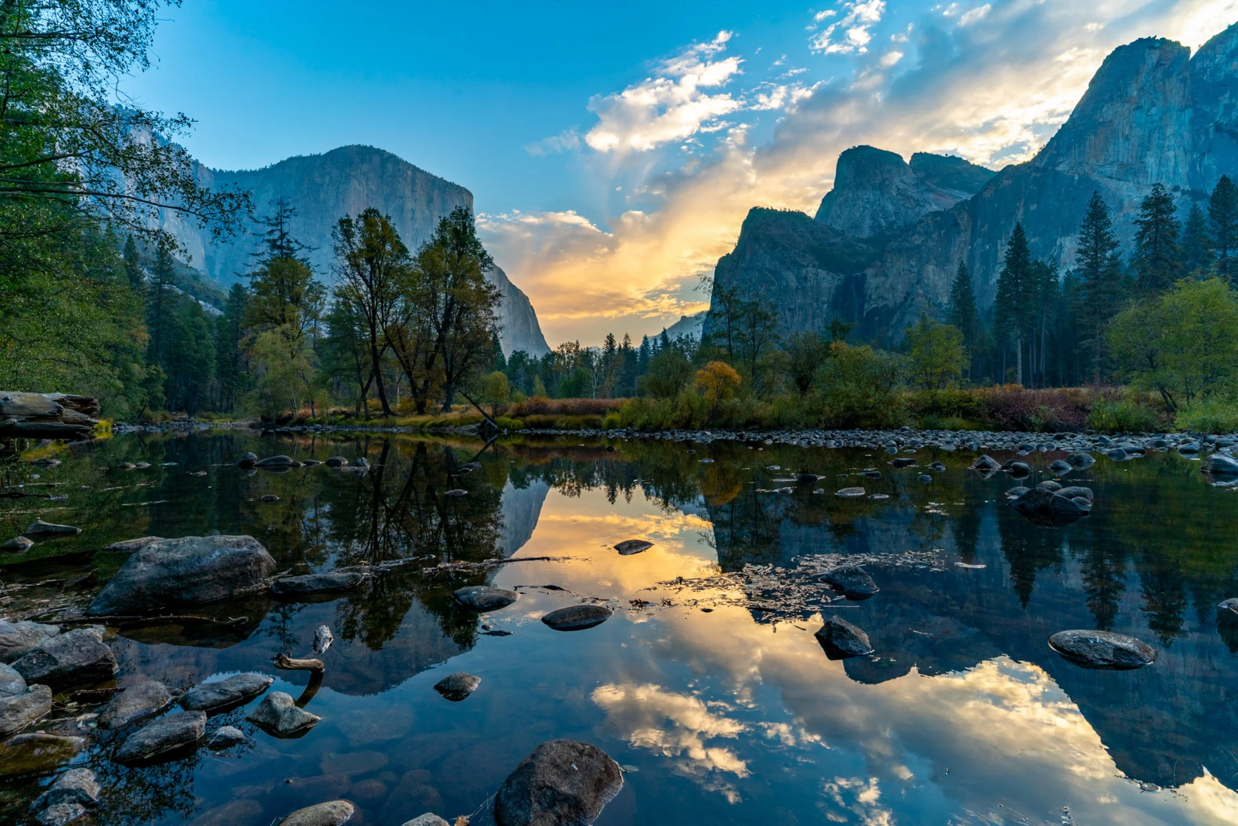 Valley Mirror 
The morning light catching the granite walls of Yosemite, perfectly doubled in the quiet flow of the Merced River.