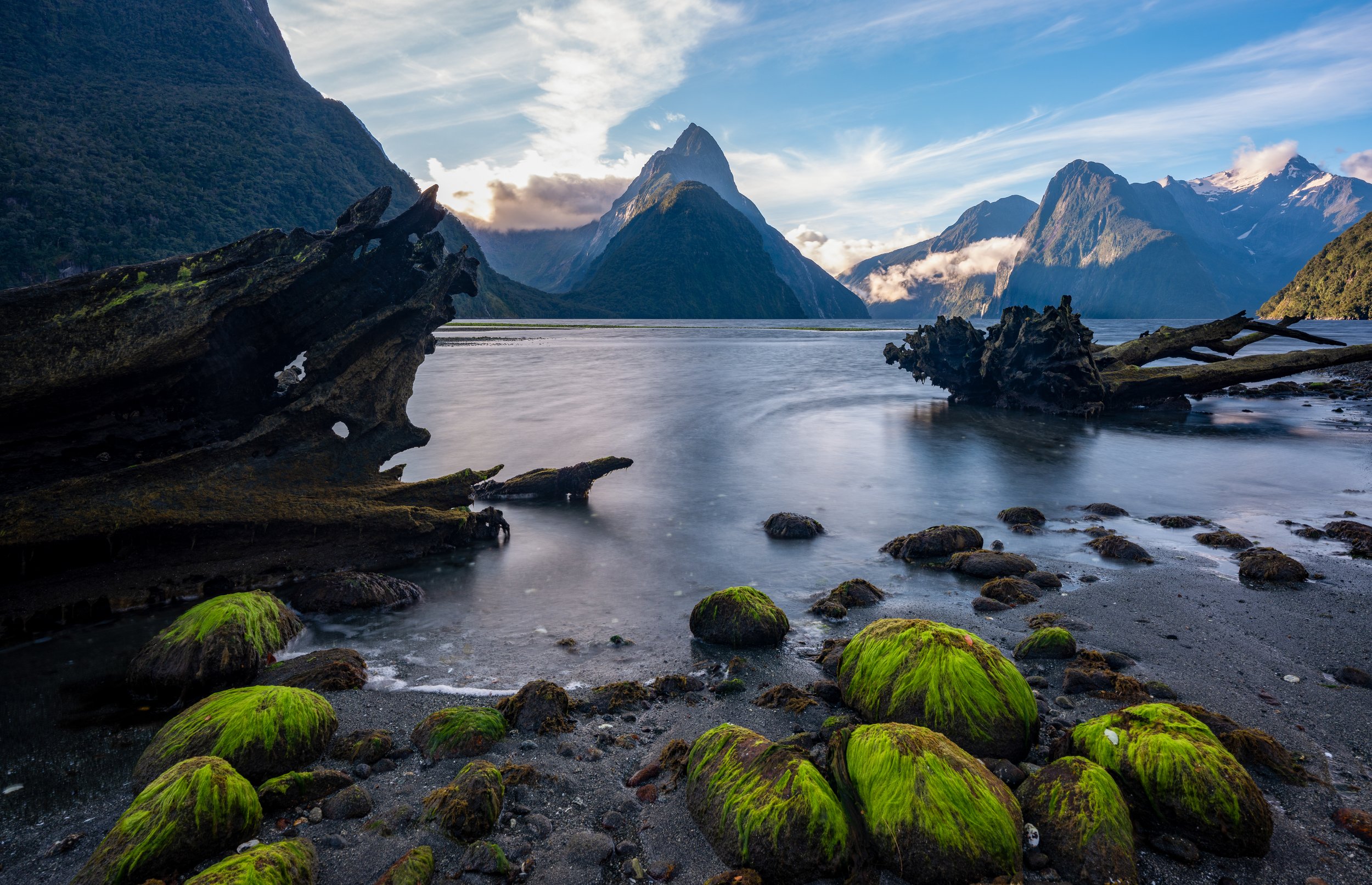 New Zealand Fjords
Low tide at sunset, showcasing the mist-shrouded peaks in Fiordland National Park.