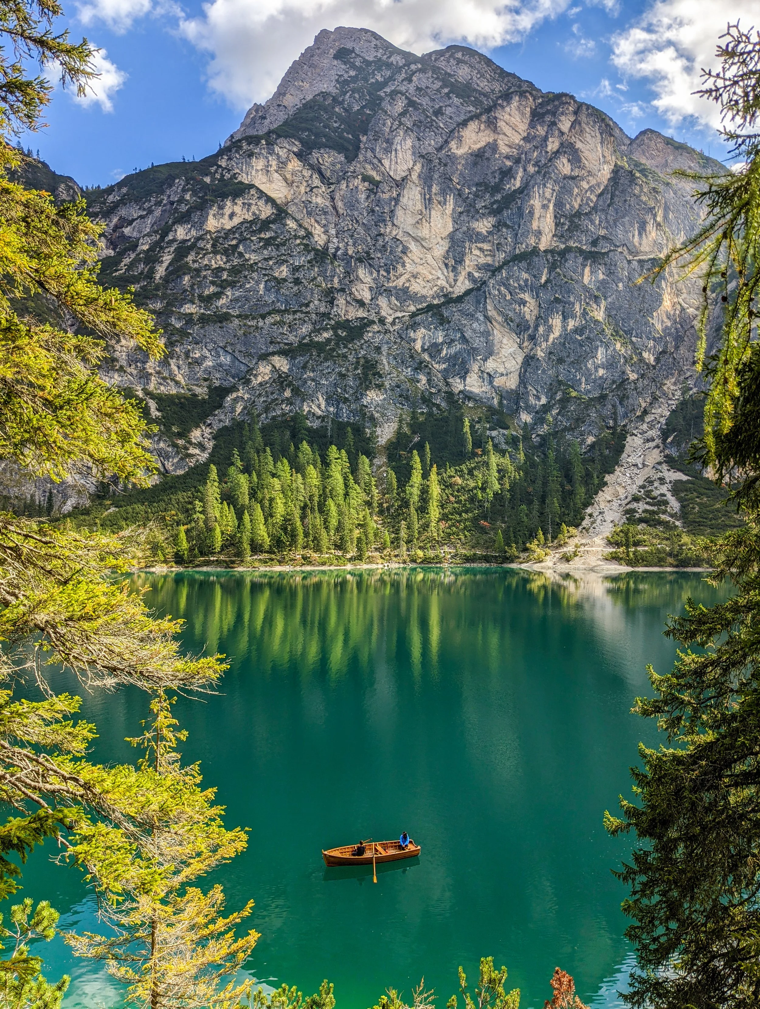 Mirror of the Dolomites
The emerald waters of Lago di Braies reflecting the massive Seekofel massif. This shot, featuring the iconic wooden boat and the still morning surface, captures why this is considered the "Pearl of the Alpine Lakes."