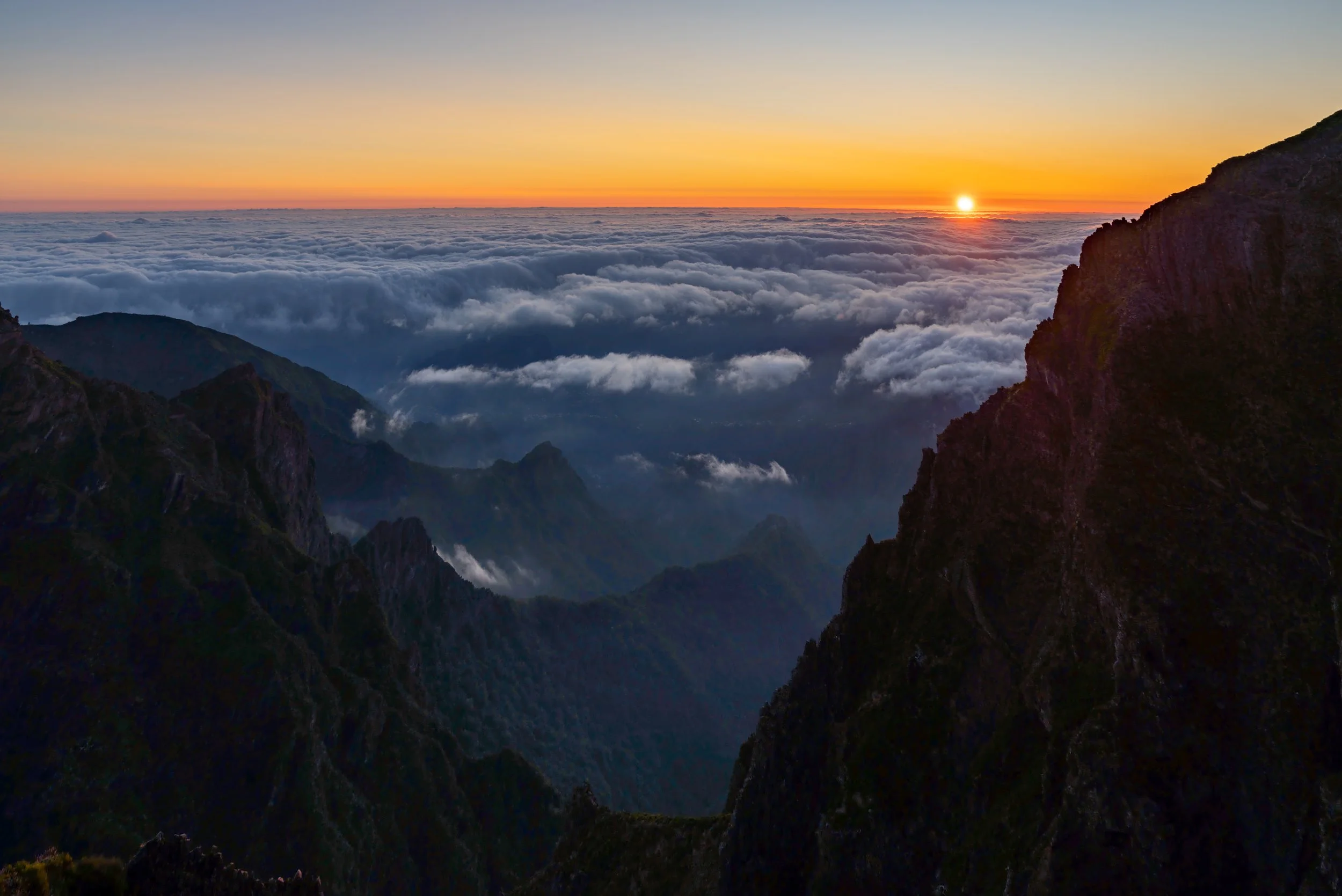 Madeira’s Spine 
The narrow, breathtaking stone path along the PR1 ridge between Pico do Arieiro and Pico Ruivo.