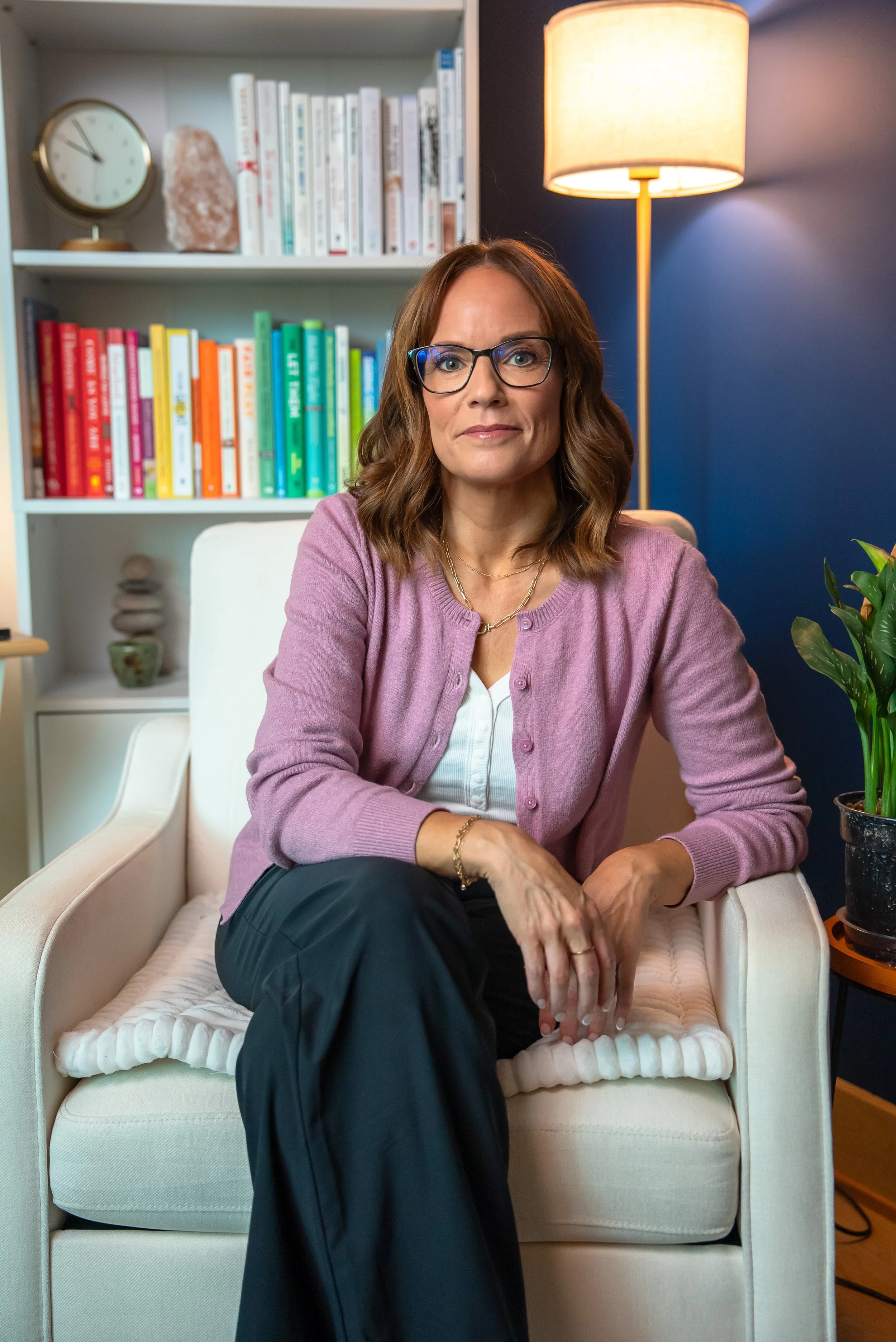 Jamie Kelly, LCSW, sitting in her salt lake city therapy office
