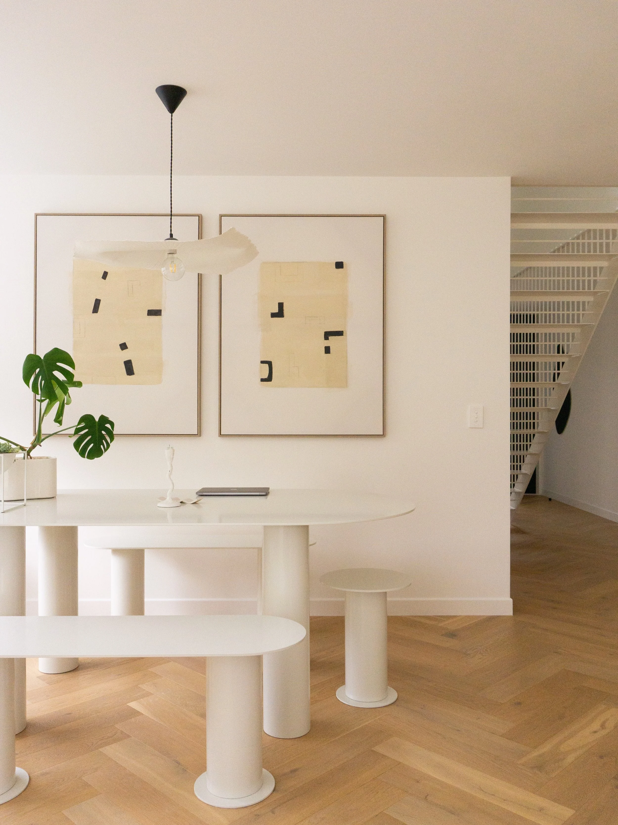 The dinning room featuring the natural light that floods the space plus the table and chairs, designed and built by us.