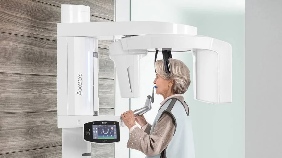 Woman using 3d digital imaging and cone beam CT