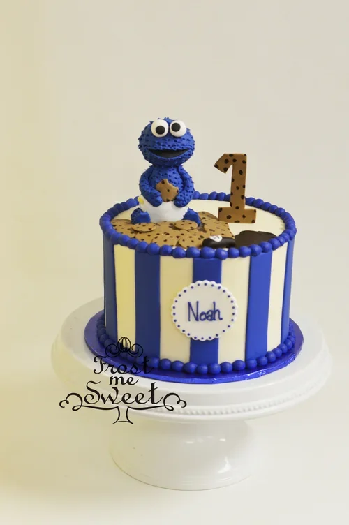 BABY COOKIE MONSTER 1ST BIRTHDAY CAKE.webp