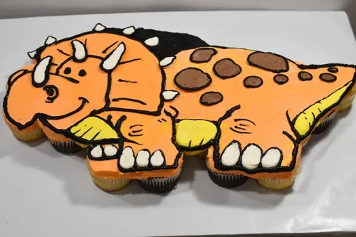 dino+cupcake+cake.webp