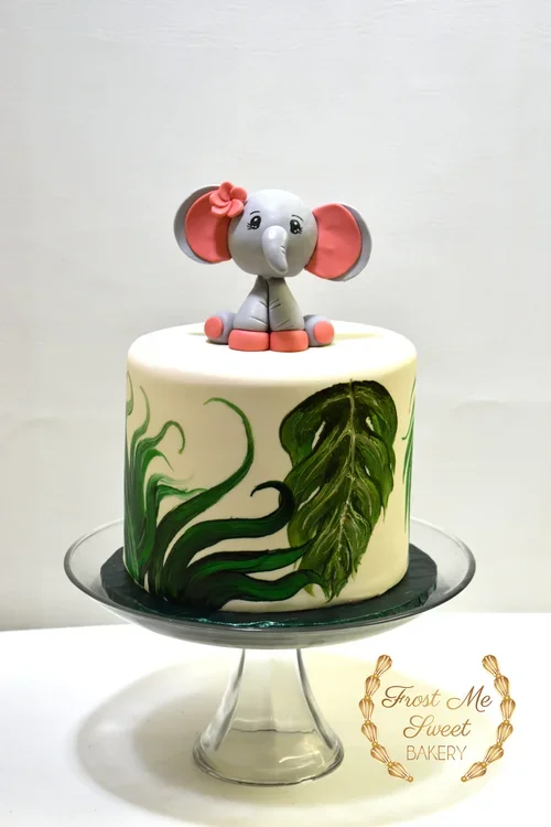 baby+elephant+and+painted+leaves+cake.webp