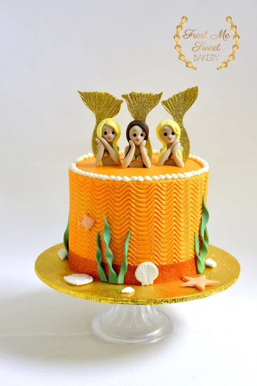 3 mermaids cake.webp