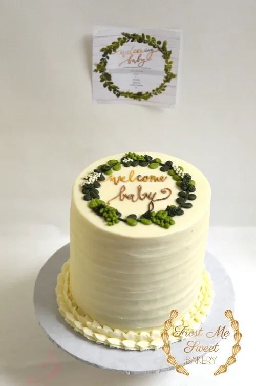 greenery+wreath+baby+shower+cake+with+no+cupcakes Baby Shower cake.webp