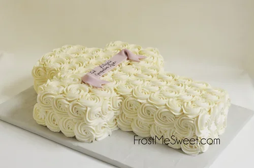 rosette+cross+cake+2.webp