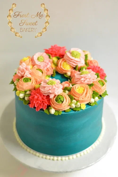 teal+with+bright+BC+flowers.webp