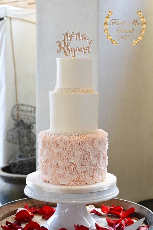 buttercream+with+rosette wedding cake.webp