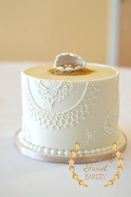 seashell+and+mendhi+piped+wedding+cutting+cake sMALL 1 TIER WEDDING CAKE.webp