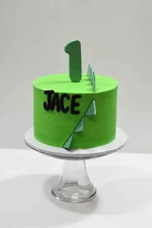 dino+spike+cake 1ST BIRTHDAY CAKE.webp