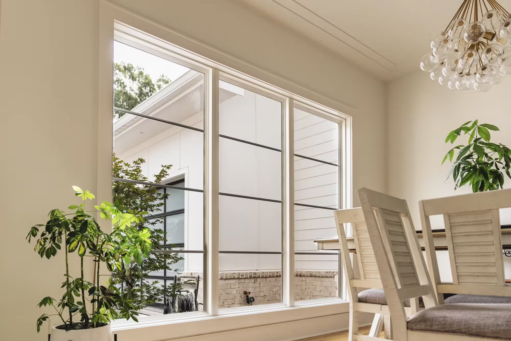 Natural light through kitchen bay window with window tint by Luxevue Utah's Premium Window Tint Installer