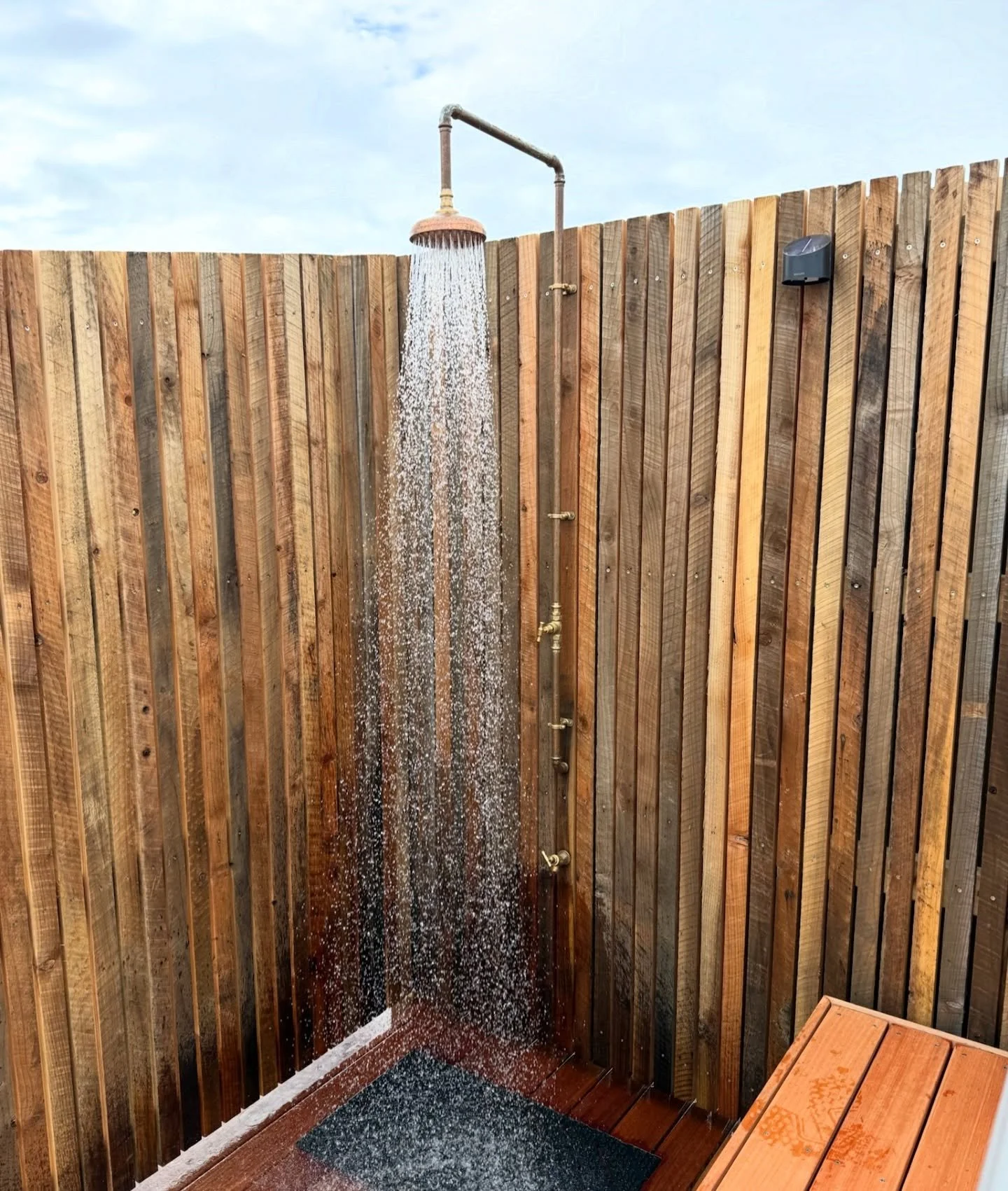 Post sauna outdoor shower