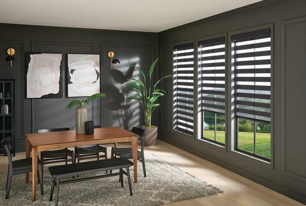 Dark fabric layered shades installed in a dining room