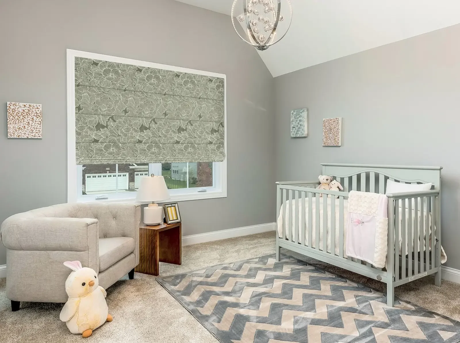 Blackout Roman shades covering nursery window