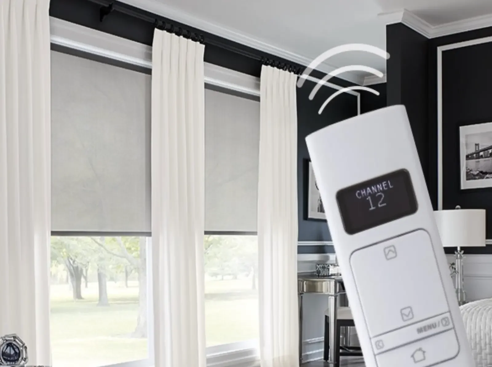 Roller shade picture highlighting a remote control showing that these are motorized roller shades.