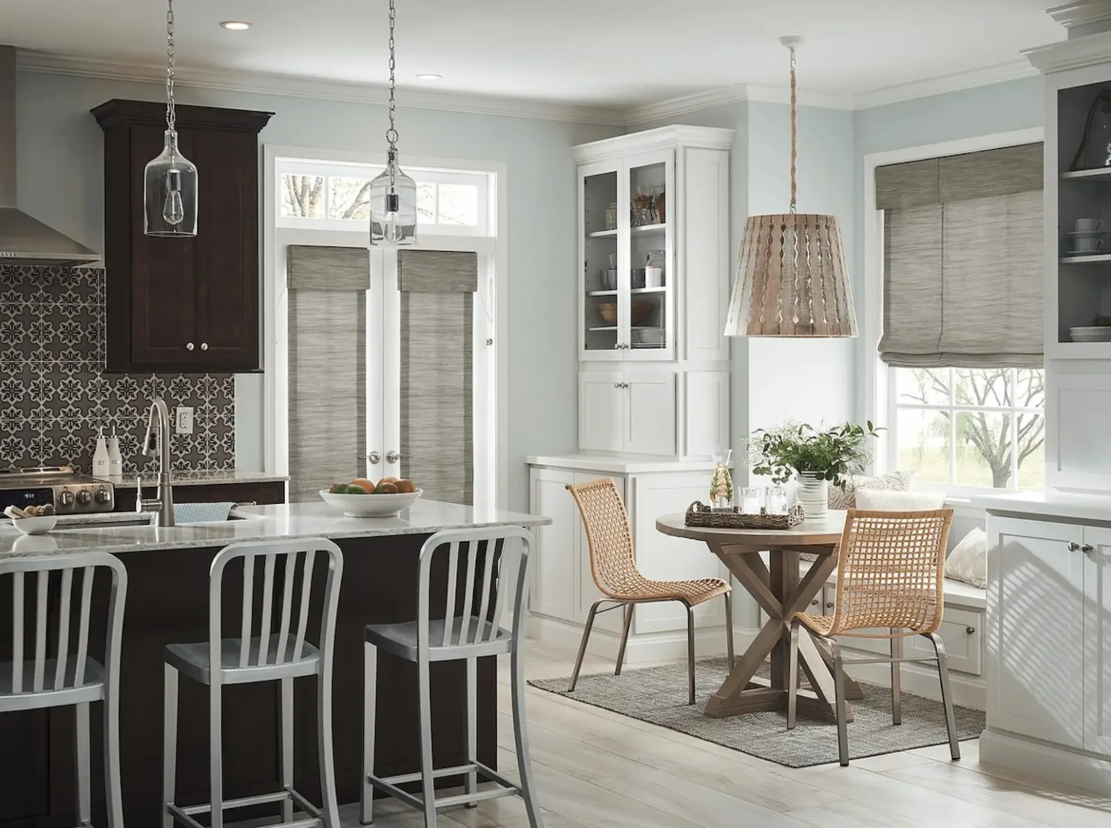 Neutral Roman shades complementing hardwood floors and modern trim