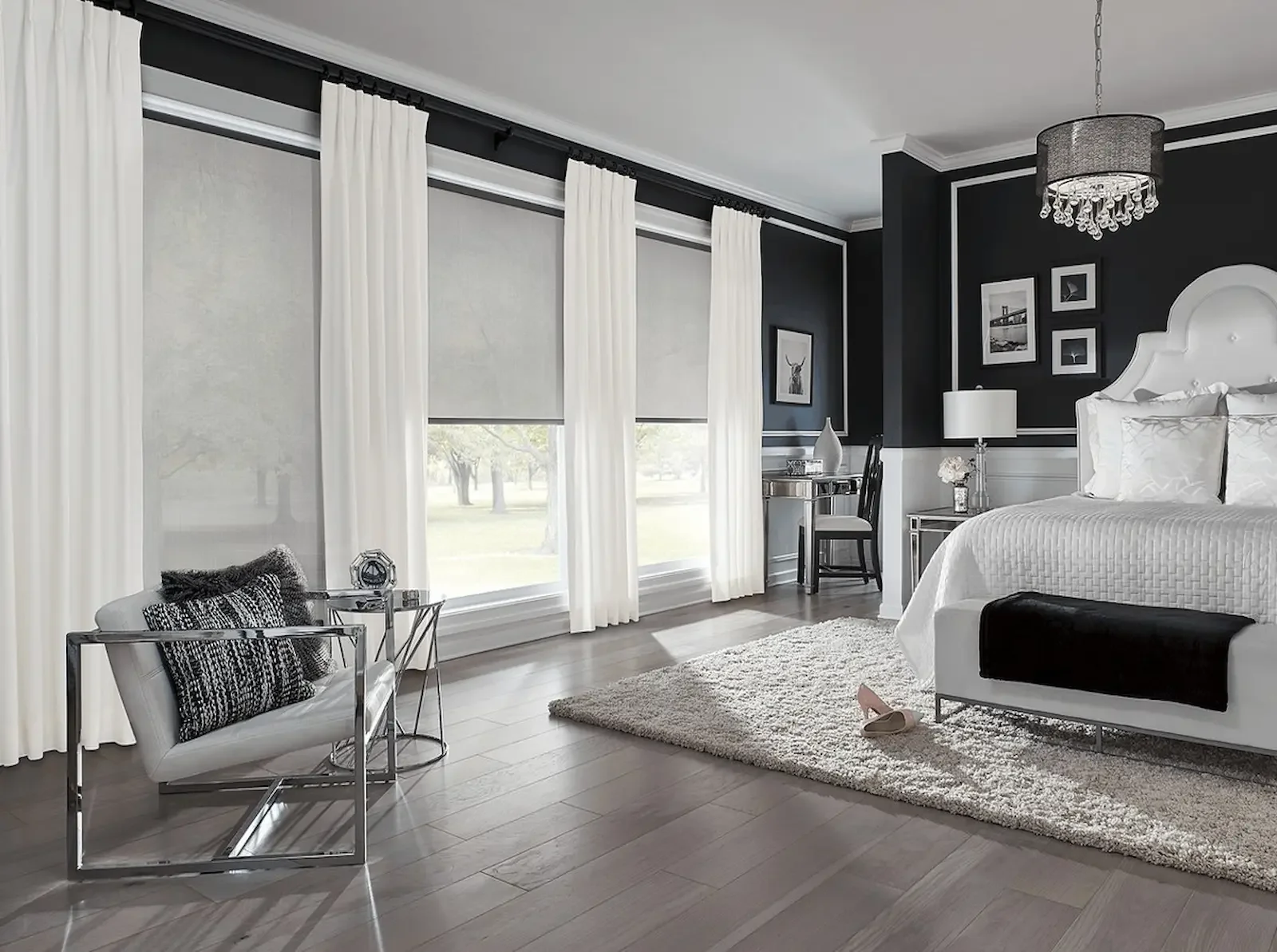 Motorized solar shades partially lowered to preserve outdoor views