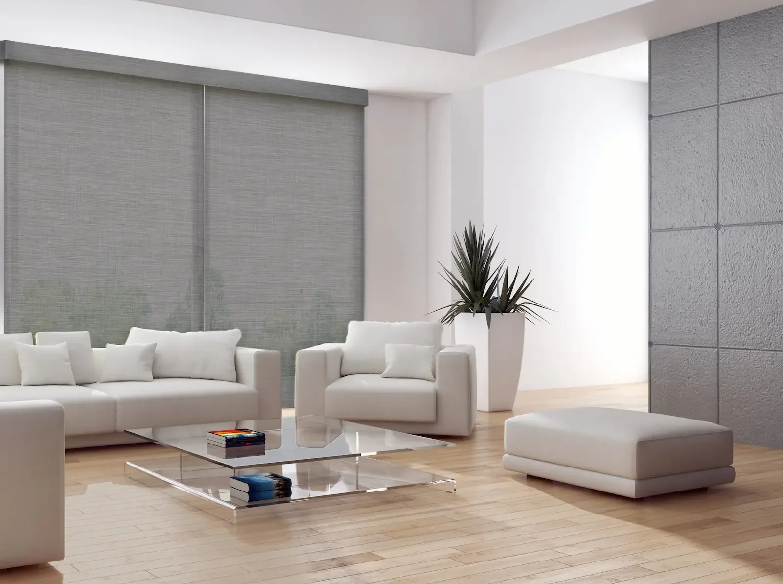 Large solar roller shades reducing glare in a living room with tall windows