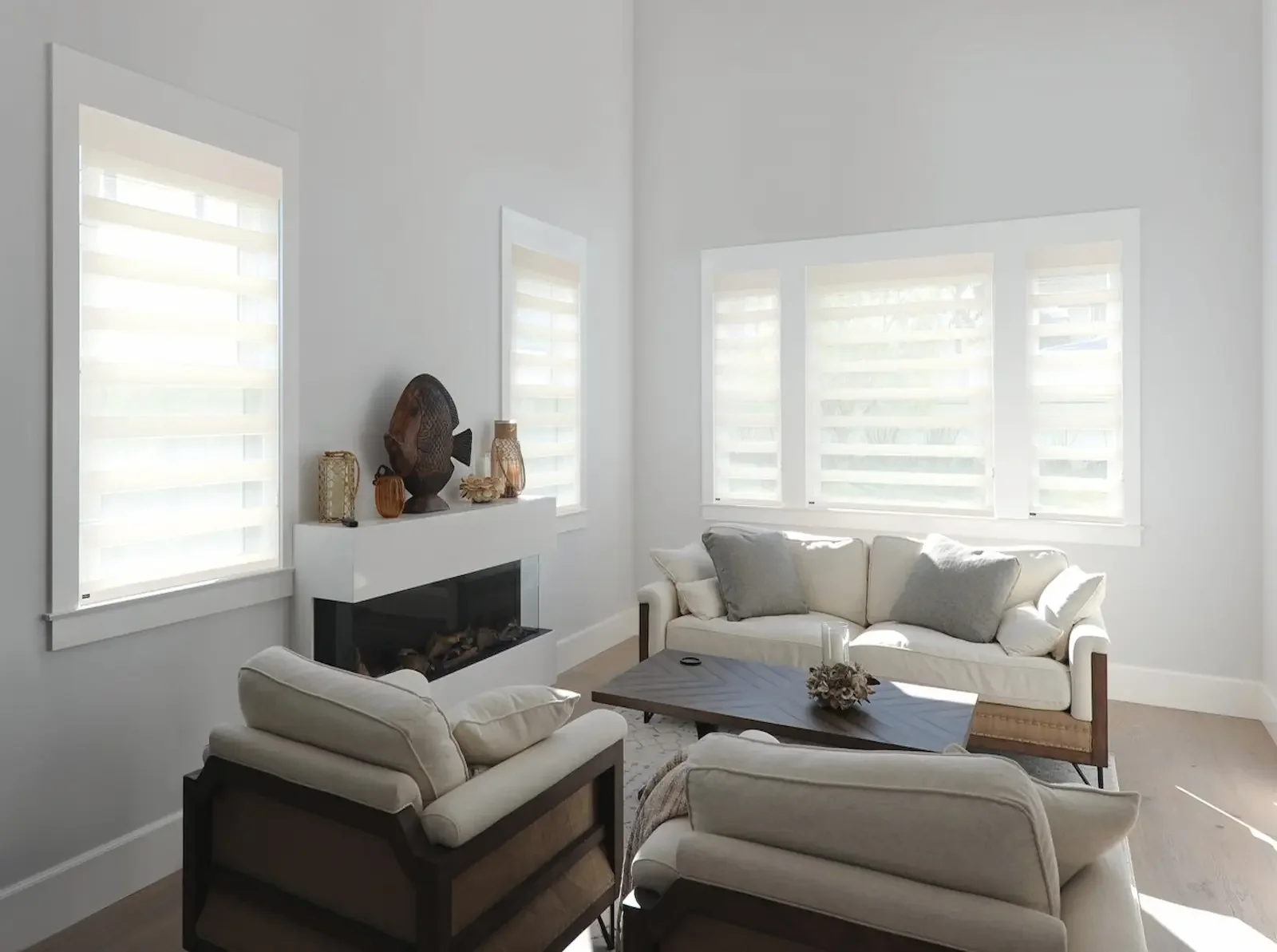 Motorized Norman sheer shades integrated with home automation controls