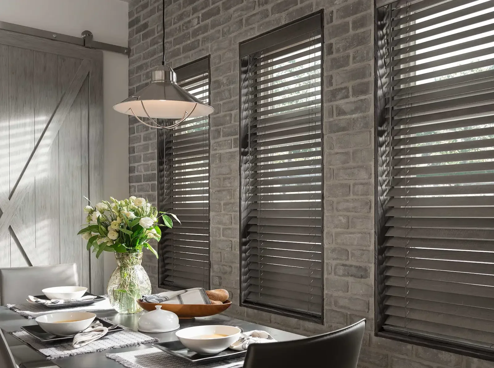 Stained wood blinds fit the style of this setting perfectly.