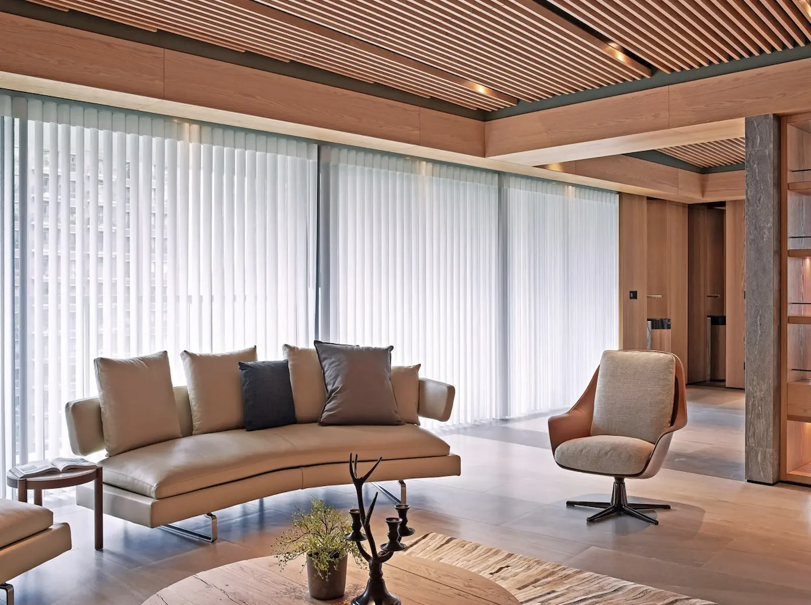 SmartDrape shades covering a wall of glass in a luxury Nashville remodel