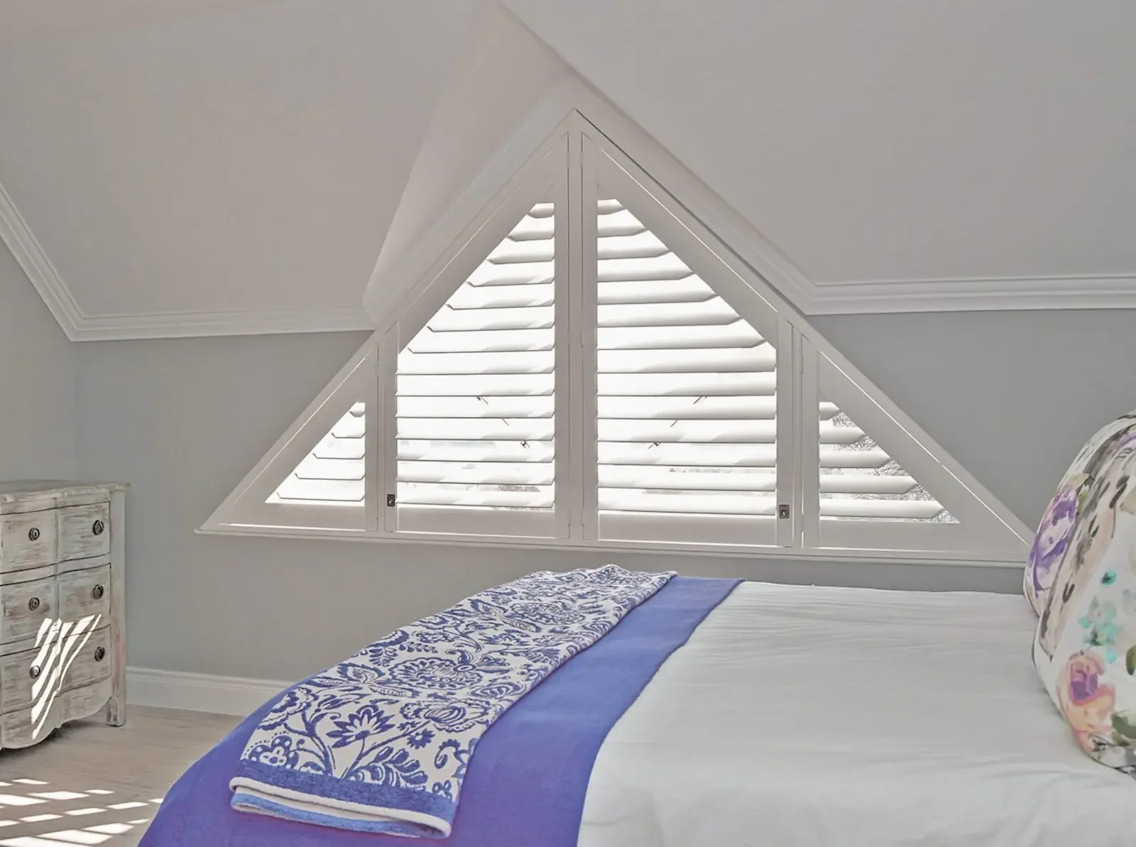 Triangular shutters. Shutters can be made in virtually any shape.