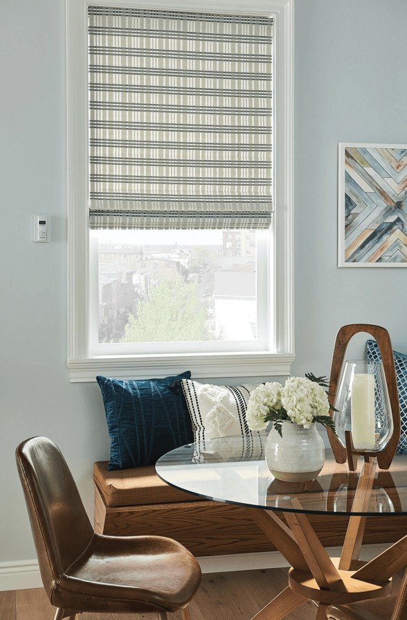 Light-filtering natural shade adding warmth to a modern farmhouse interior