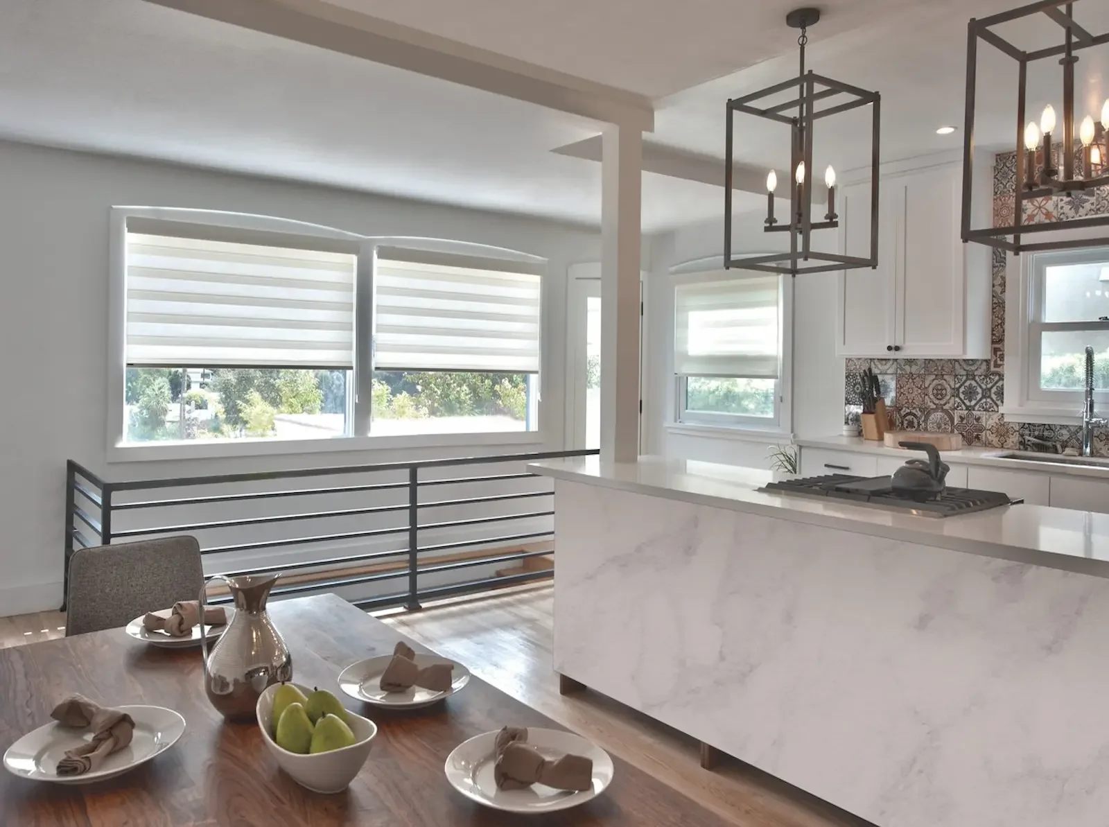 Fabric vanes inside sheer shades tilted to control glare