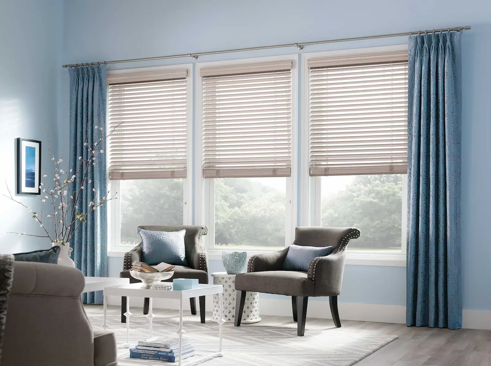 Wood blinds paired with decorative drapery panels