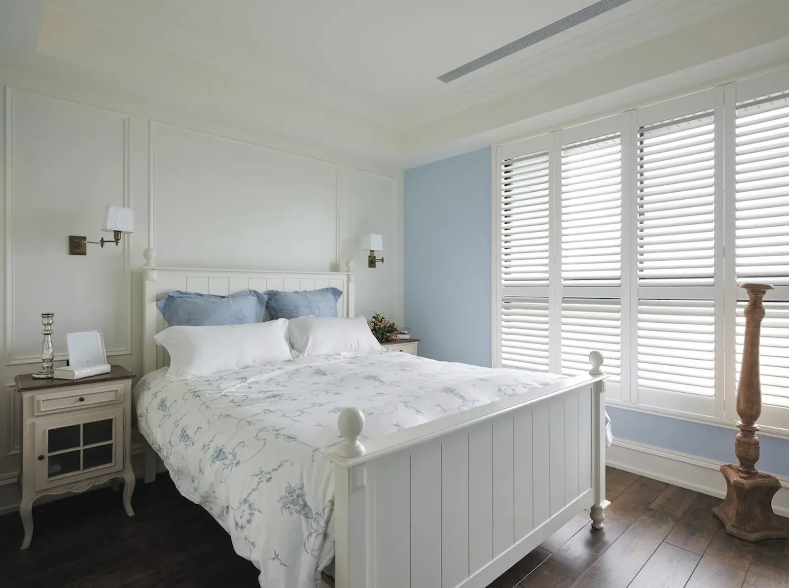 Plantation shutters on a wide double window