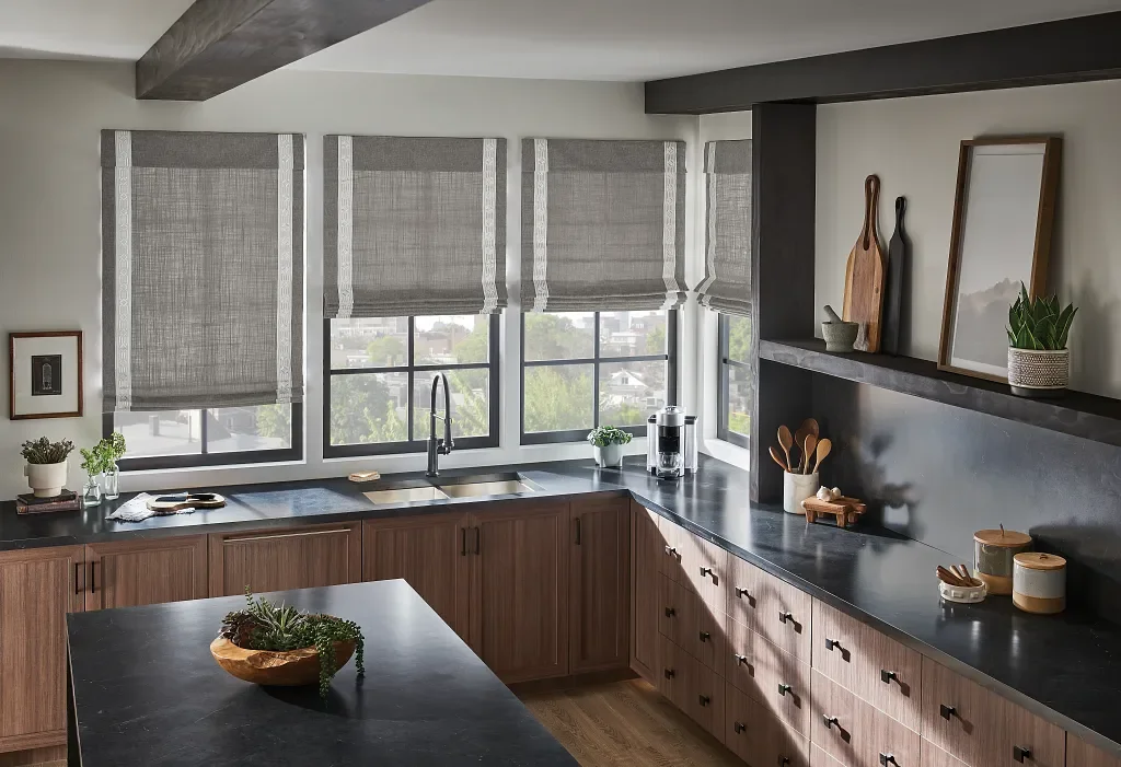 Neutral colored fabric Roman shades with decorative banding down the sides