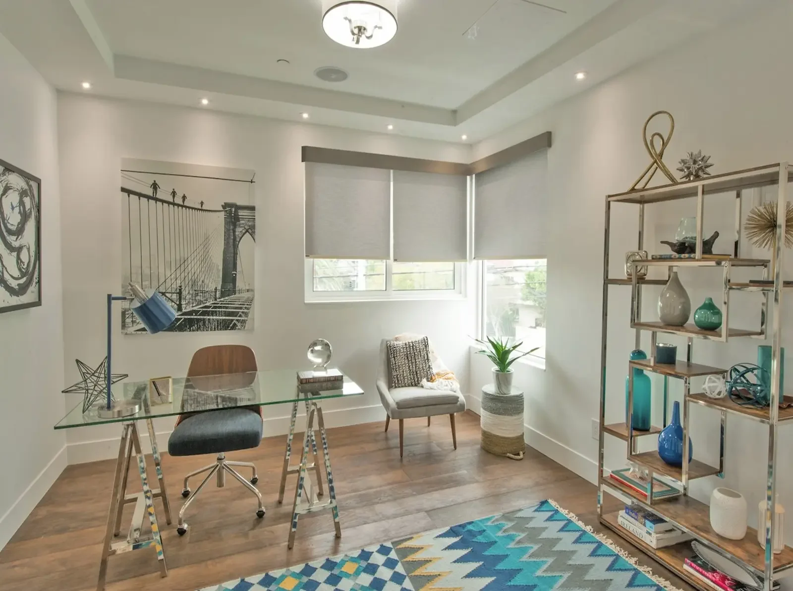 Custom roller shades inside a large corner window