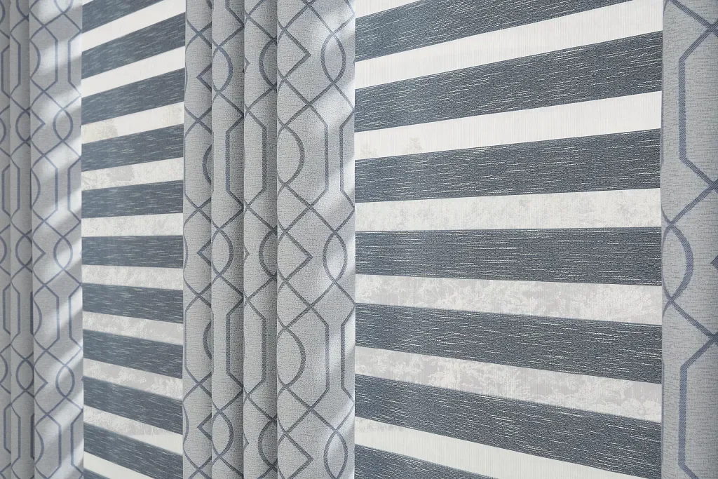 Layered window treatments: draperies with coordinating shades