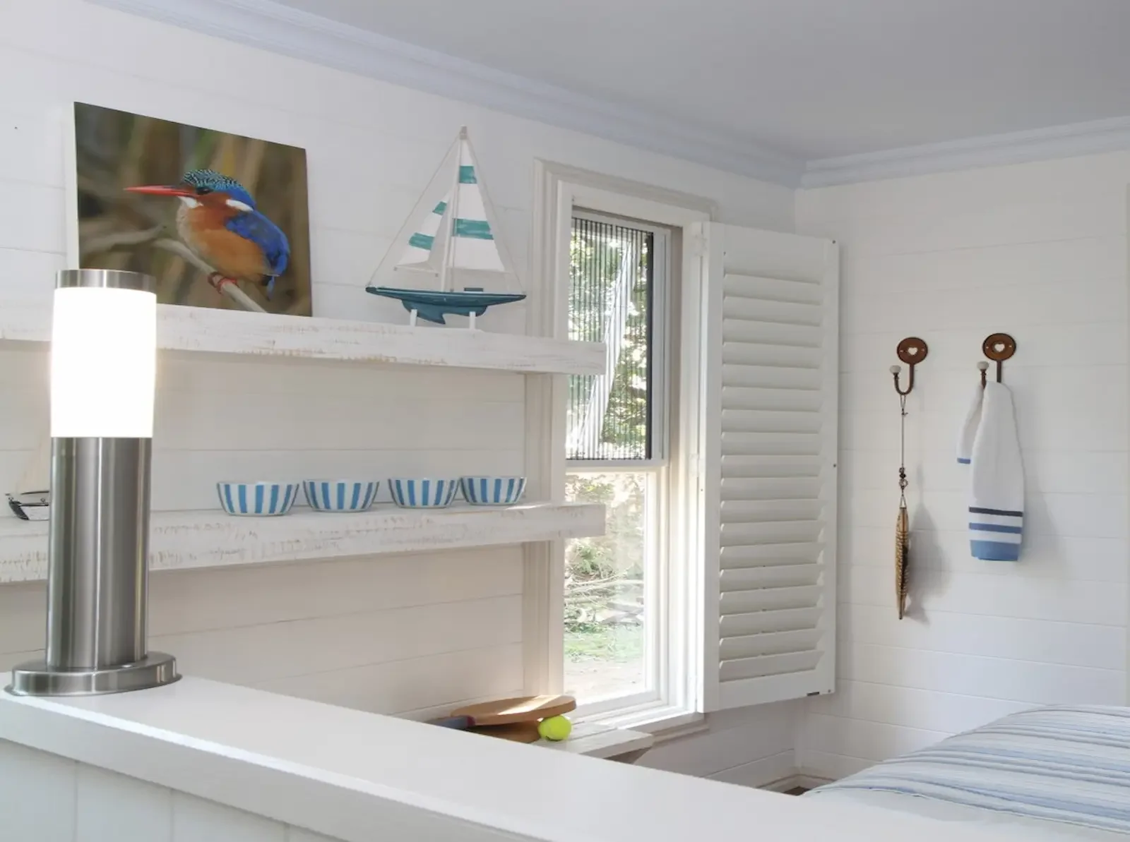 Shutter hinged open for full light and view