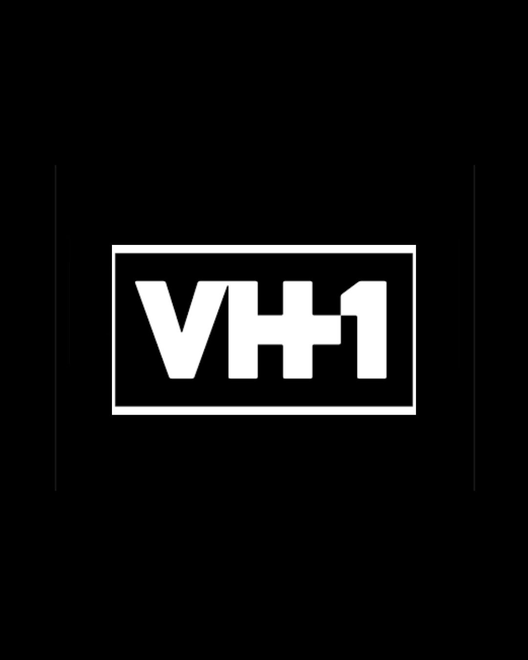 Black background with a white rectangular border containing the text "VH1" in bold, white, capital letters.
