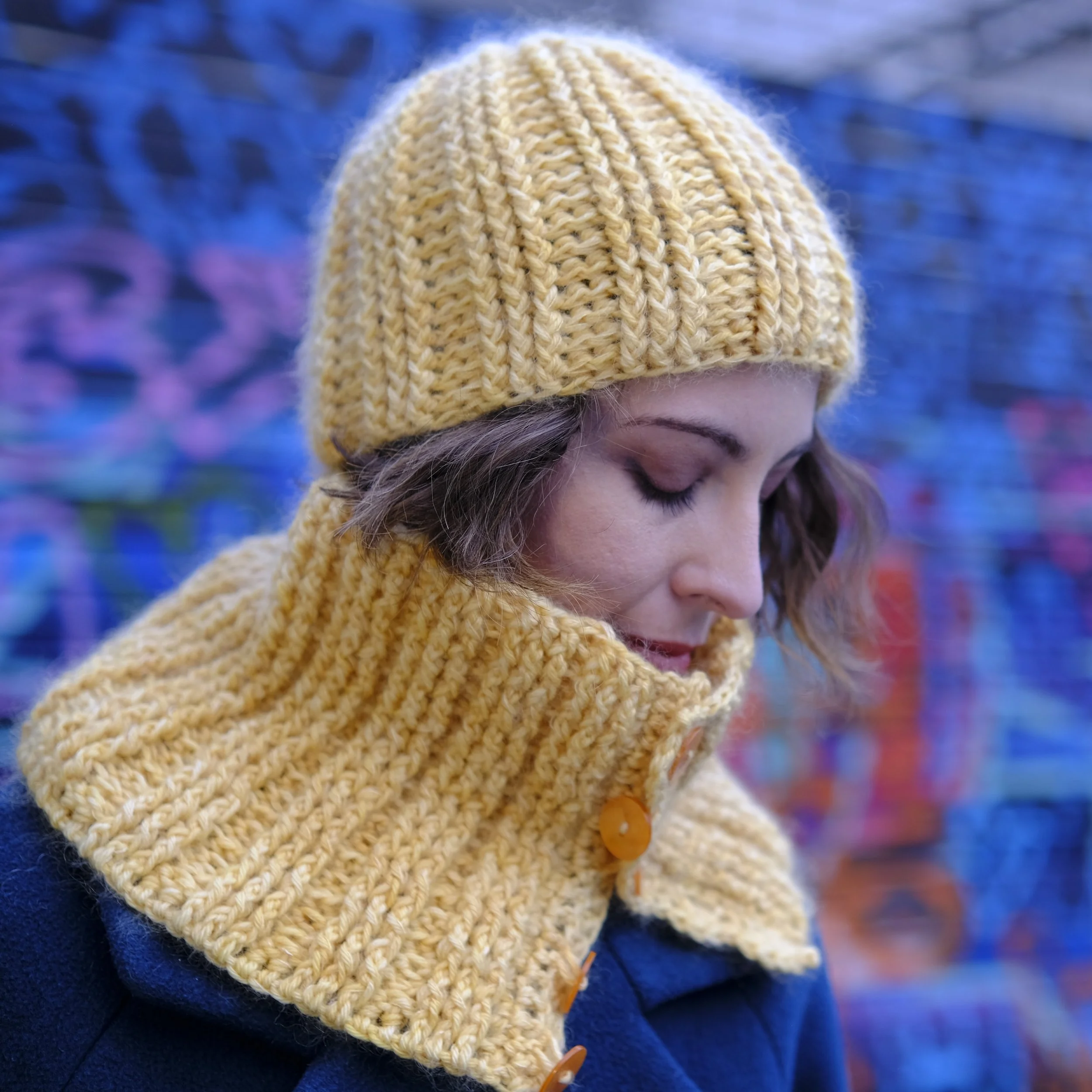 Next up in the previews of the patterns in my upcoming book, we have the Windsor Hat and Cowl.

It is made using both wool and a mohair laceweight yarn, which gives it a beautiful halo and softens the front and back post stitches.

This set features 