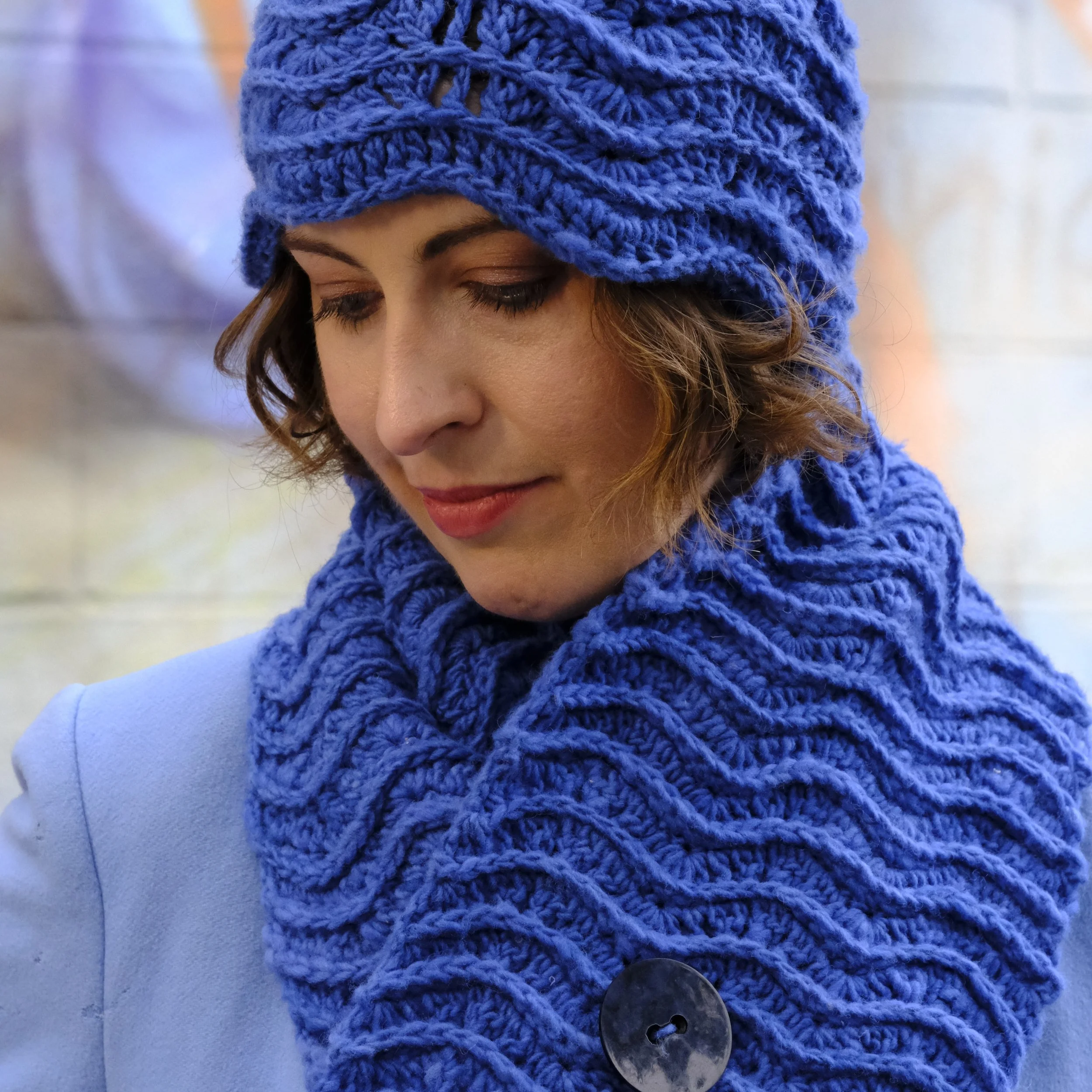 Next up in the preview of my upcoming crochet pattern book, the Ocean Hat and Scarflet!

I just love the wave edging on the cloche hat, and this set is super warm and practical for a cold day. Made using Noro Malvinas in Azure.
