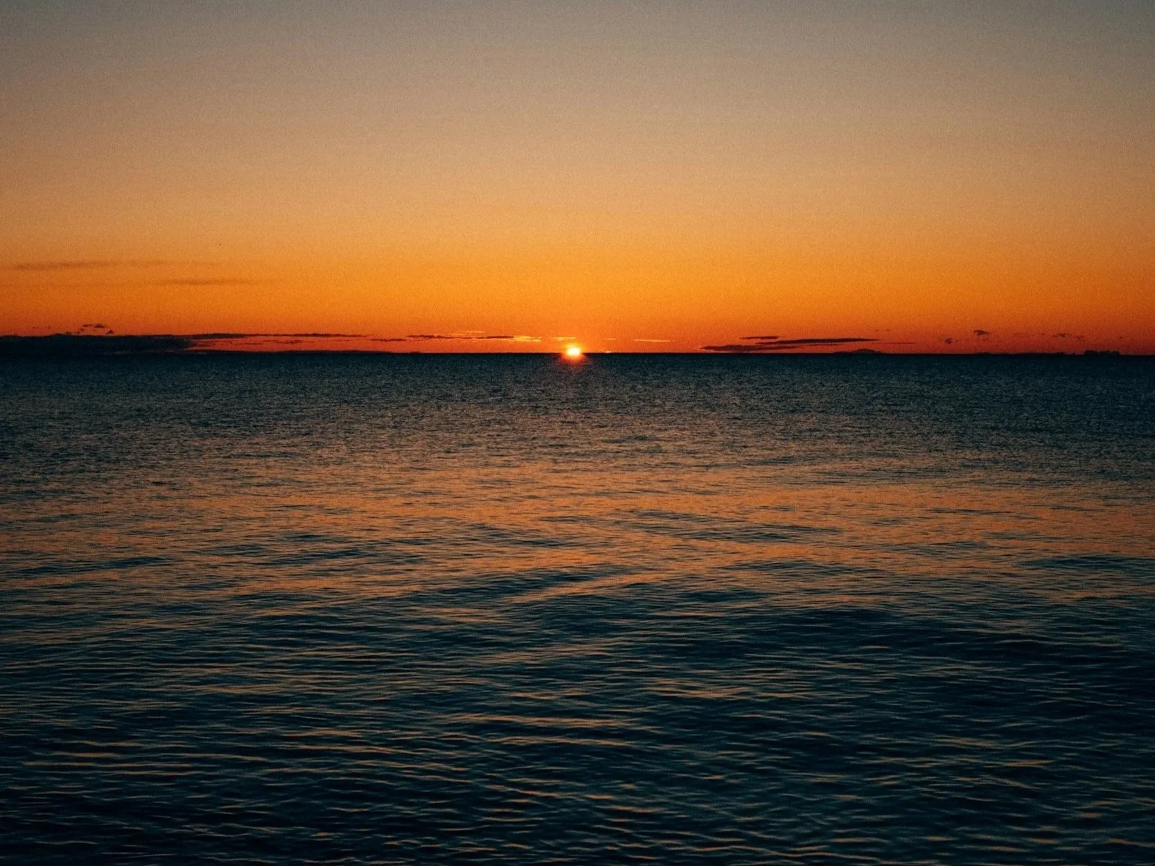 Peaceful lakeside sunset in northern Minnesota.