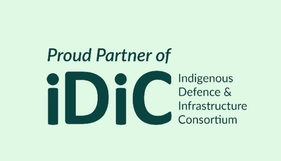Logo of the Indigenous Defence & Infrastructure Consortium with the text "Proud Partner of iDiC" on a light green background.